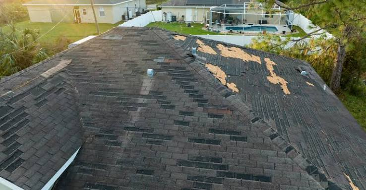 Roof with widespread surface loss and deterioration