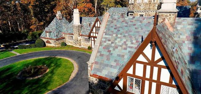 Slate roof displaying natural green, gray, and burgundy color variation